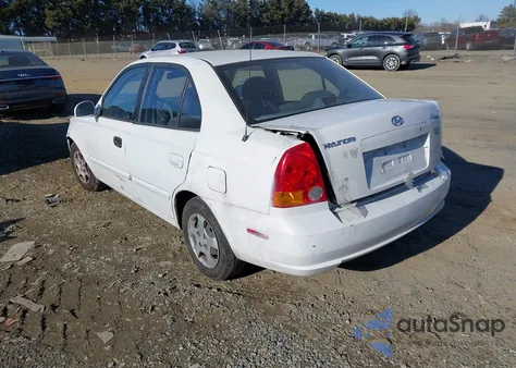 2005 Hyundai Accent Gls z USA, uszkodzony, nr VIN KMHCG45C15U612612